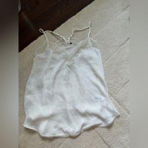 Lulu’s white satin and lace tank top
